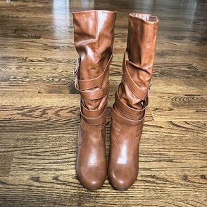 New unworn boots with 3 inch heel